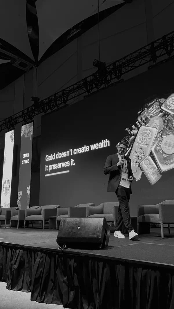 Felipe on stage at Blockchain Jungle, black and white