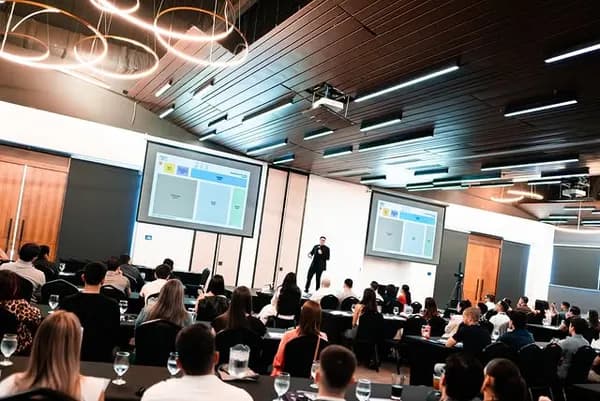 Felipe speaking at conference